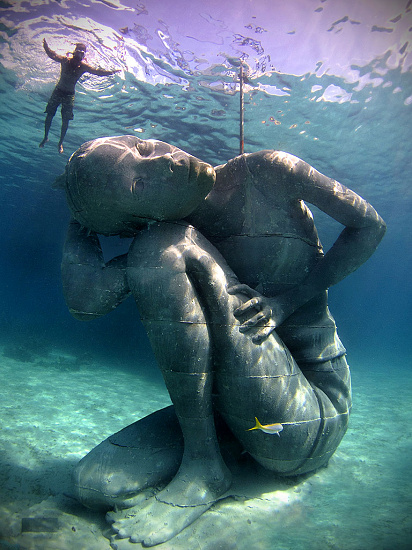 23. Jason Decaires Taylor Girl Carrying The Ocean On Her Shoulders